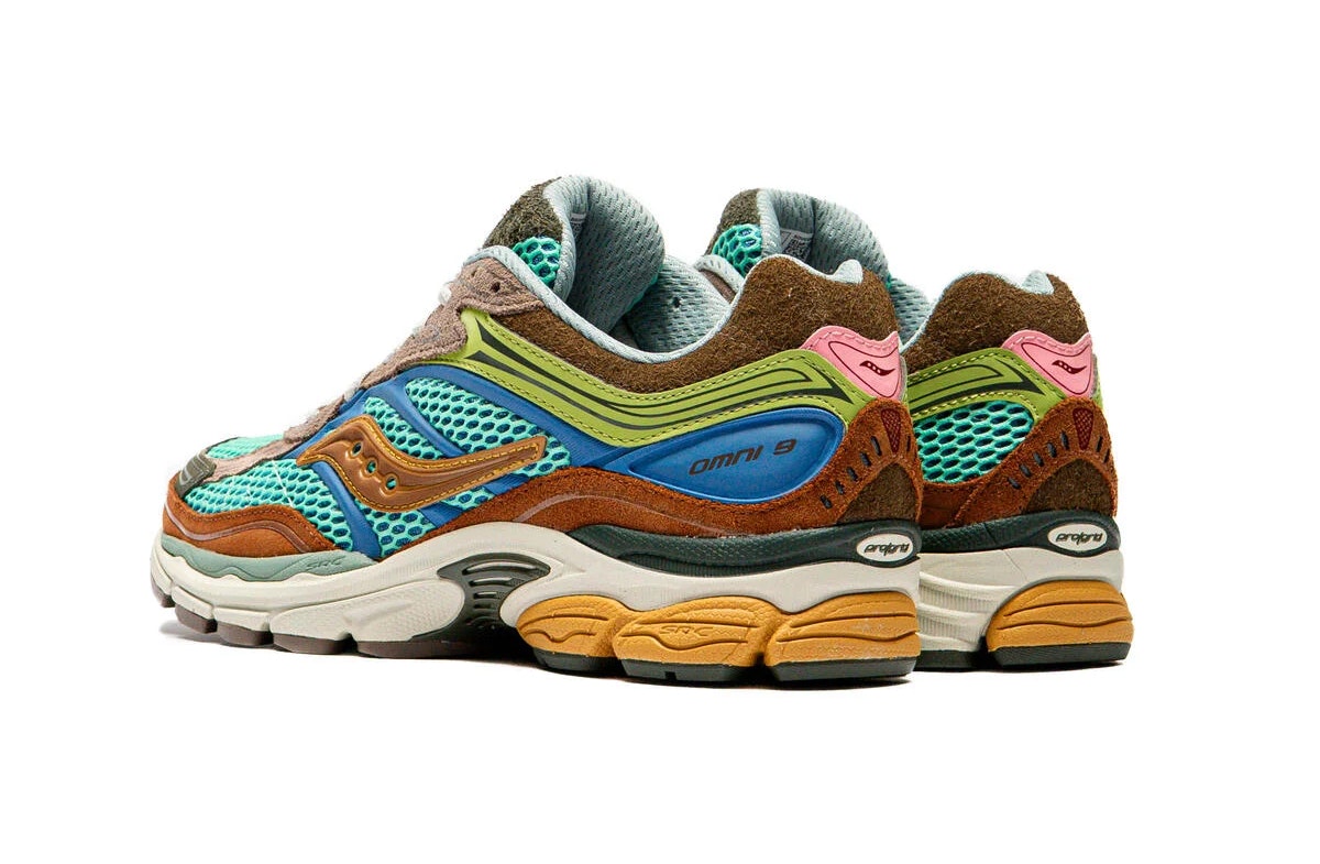 CAPE EXCLUSIVES Saucony ProGrid Omni 9 sneakers met zwart en grijs ontwerp, sportieve schoenen voor heren.