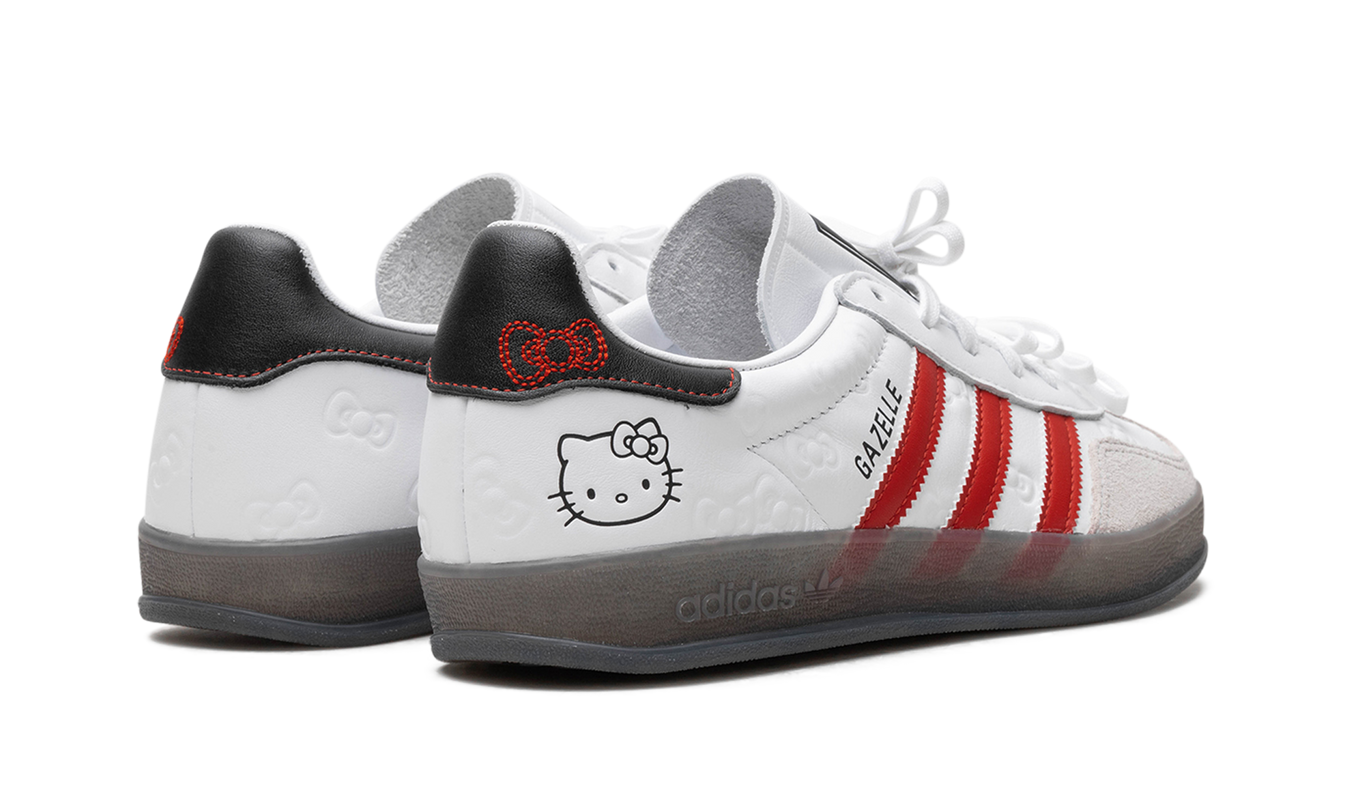 Dames Adidas Gazelle Indoor schoenen "50e Verjaardag - Hello Kitty" met witte en roze details, geschikt voor binnen.