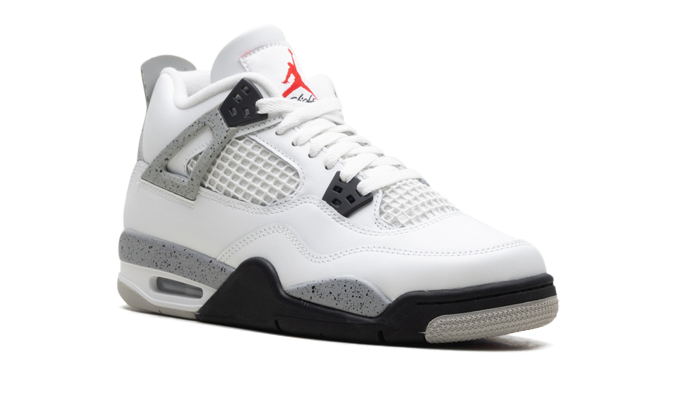 Witte Air Jordan 4 Retro GS schoenen met cementpatroon en zwart detail, sportieve sneakers voor jongeren