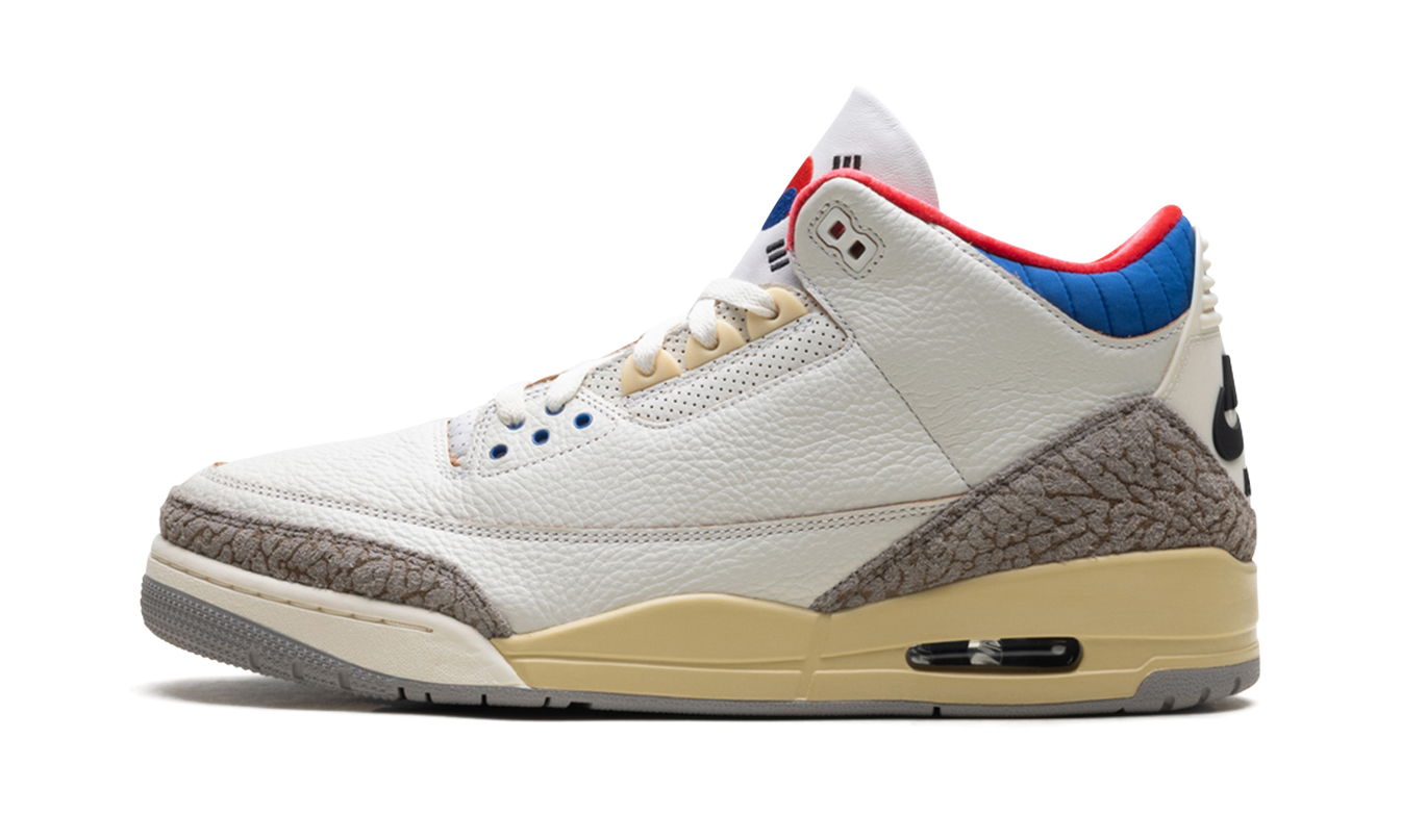 Zwarte Air Jordan 3 "Seoul 2.0" sneakers met grijze details en witte zool, zichtbaar op een witte achtergrond.