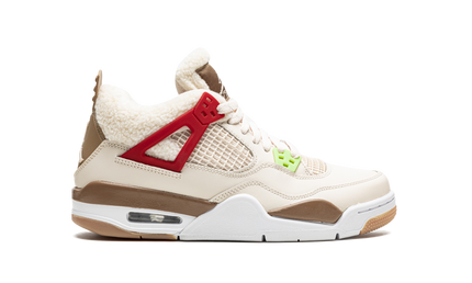 Sportieve Air Jordan 4 Retro GS schoenen in wild dierenthema met opvallende details en levendige kleuren.