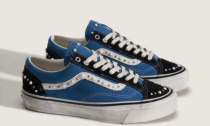 Zwarte en navy Vans LX Old Skool sneakers uit de Pearlized Pack, CAPE EXCLUSIVES, met glanzende afwerking en klassieke stijl.
