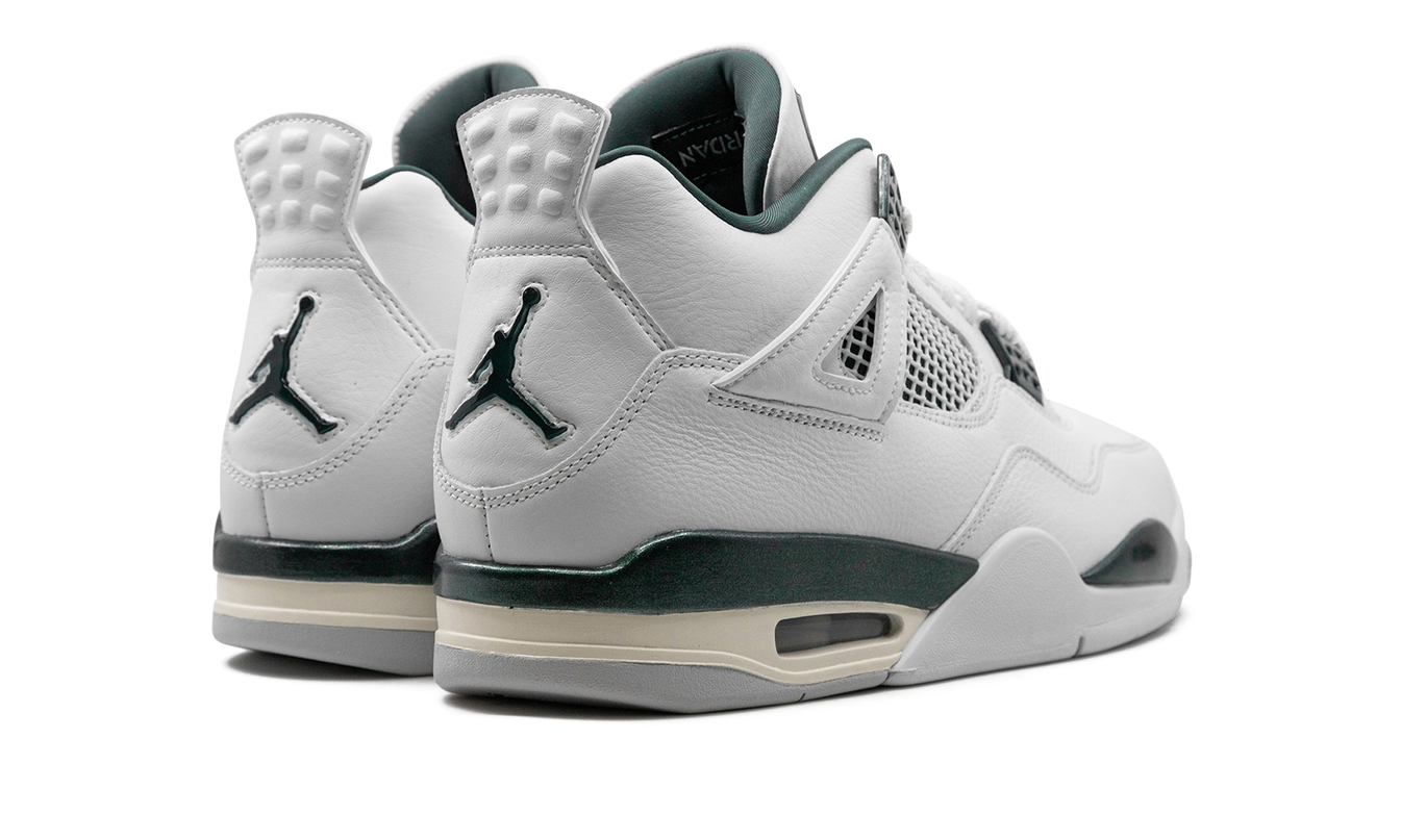 Groene Air Jordan 4 schoenen met oxidatie-effecten, Nike sneakers voor sport en casual dragen