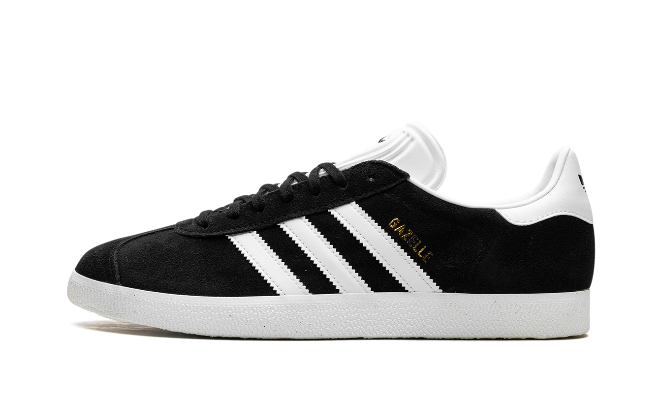 Zwarte Adidas Gazelle schoenen met witte details, casual sneakers voor dames en heren, zichtbaar op de afbeelding.