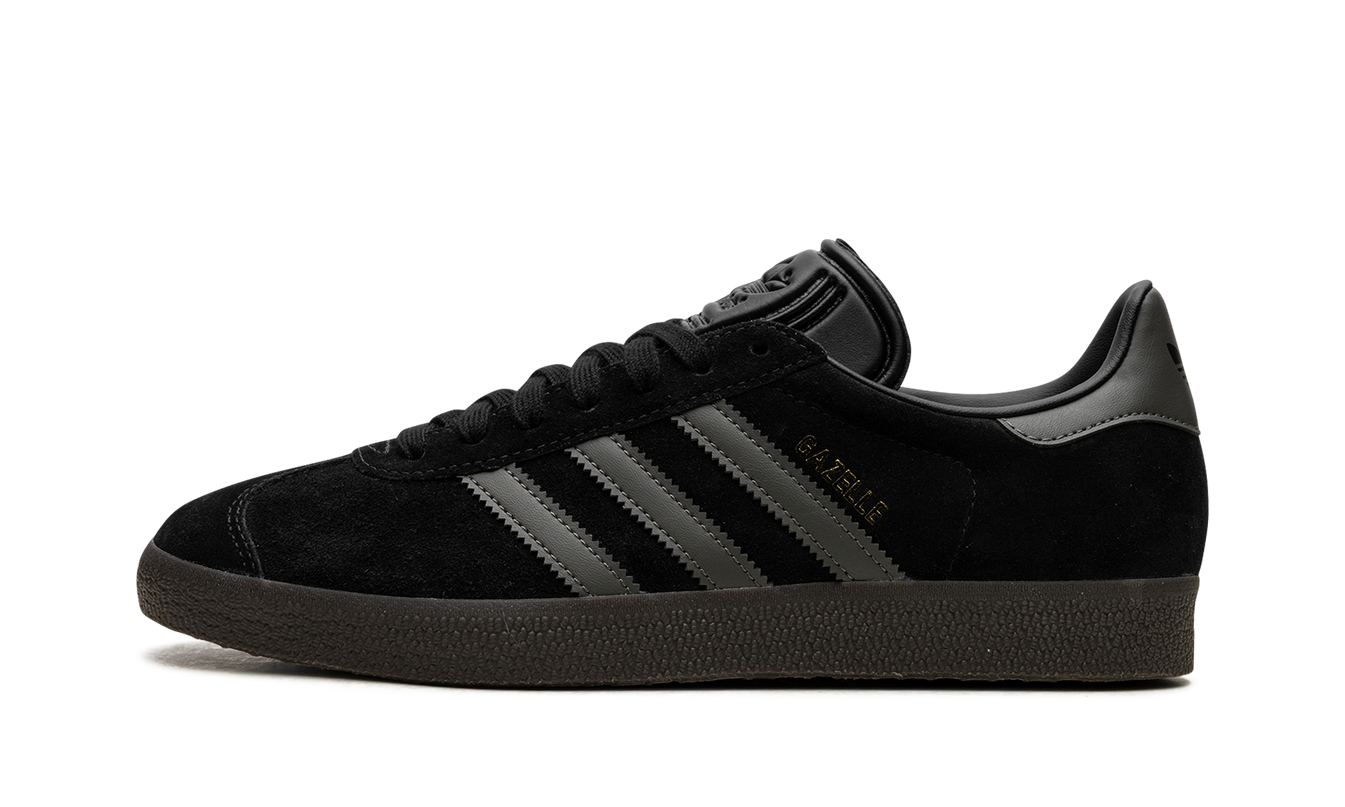 Zwarte en gouden Adidas Gazelle schoenen met leren bovenkant en witte zool, stijlvolle sneakers voor heren en dames