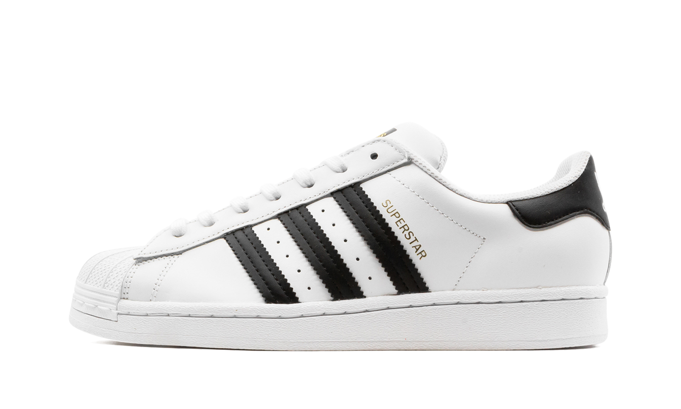 Witte en zwarte sneakers van het merk Mijn winkel, comfortabele schoenen met sportief ontwerp voor dagelijks gebruik.