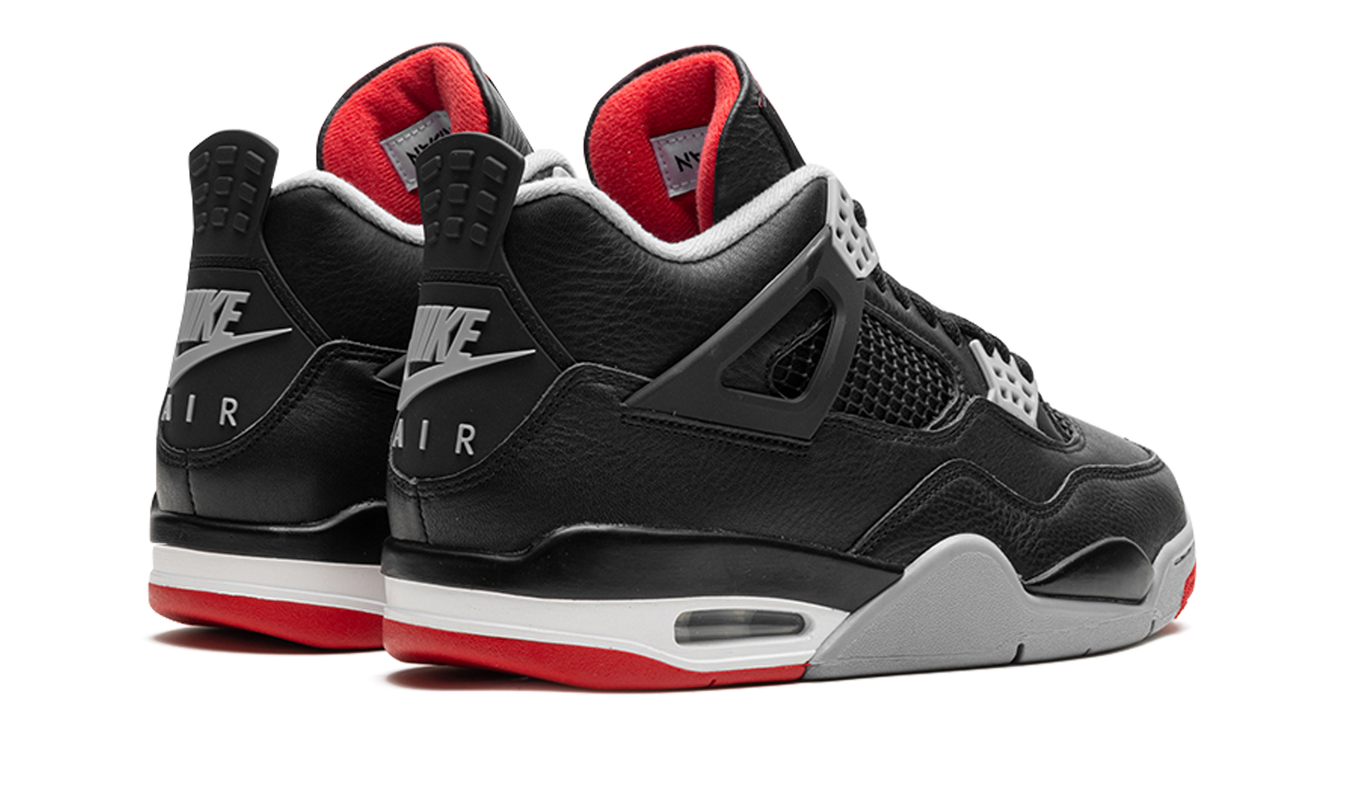 Zwarte en rode Air Jordan 4 schoenen "Bred Reimagined" met leren details en wit rubberzool, ontworpen door Mijn winkel.