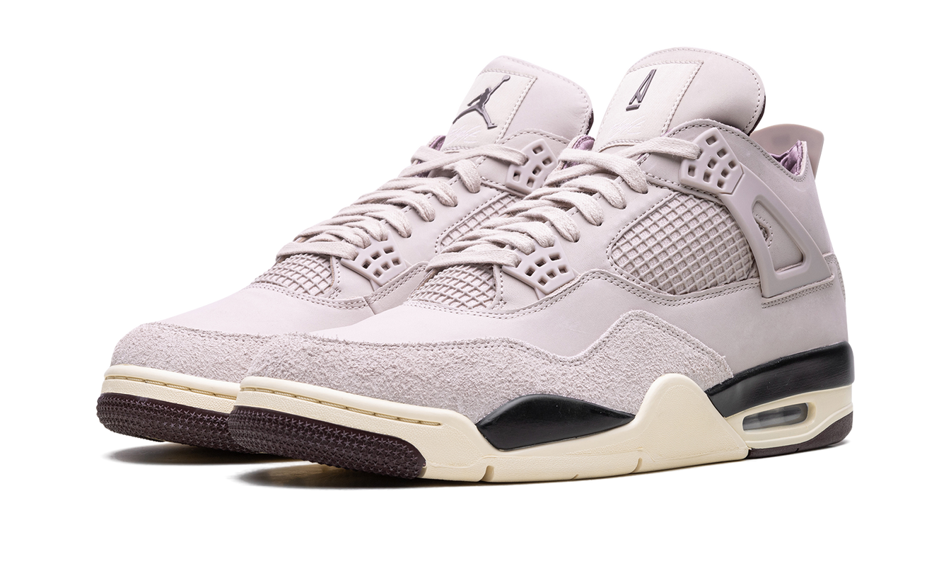 Dames Air Jordan 4 WMNS schoenen "A Ma Maniére - While You Were Sleeping" met zwarte en roze details, zichtbaar in de afbeelding