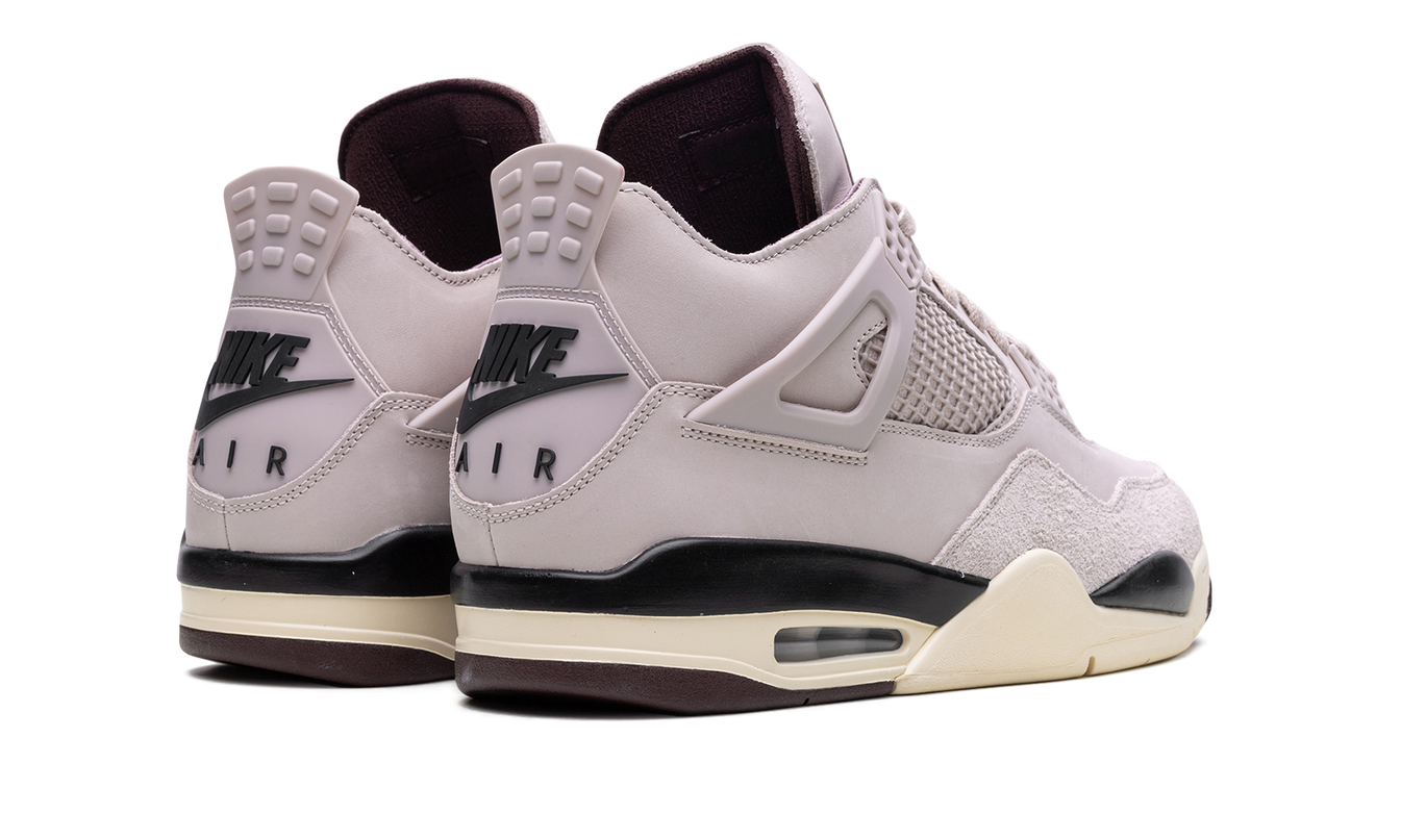 Dames sneakers Air Jordan 4 WMNS "A Ma Maniére - While You Were Sleeping" in wit en zwart, zichtbaar in close-up foto