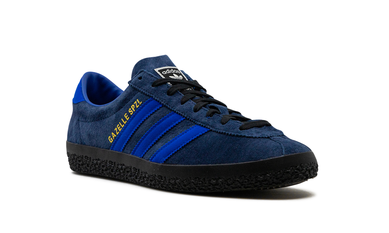Donkerblauwe Adidas Gazelle SPZL sneakers met witte zool en lussen, zichtbaar op de afbeelding.