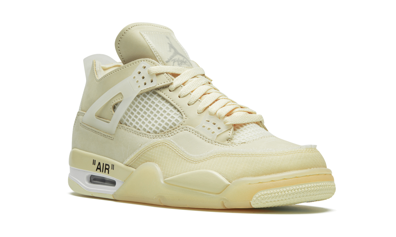 Witte Air Jordan 4 Retro SP WMNS schoenen met Off-White design en Sail details, zichtbaar van de zijkant en met veters