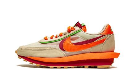 Nike LD Waffle Sacai Clot Net oranje sneakers met mesh details en witte zool, geschikt voor sport en casual gebruik