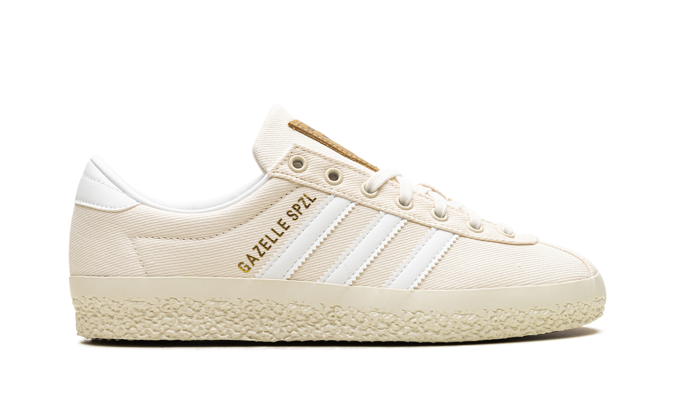 Witte Adidas Gazelle SPZL schoenen met suède bovenwerk en witte veters, populair model voor casual dragen.