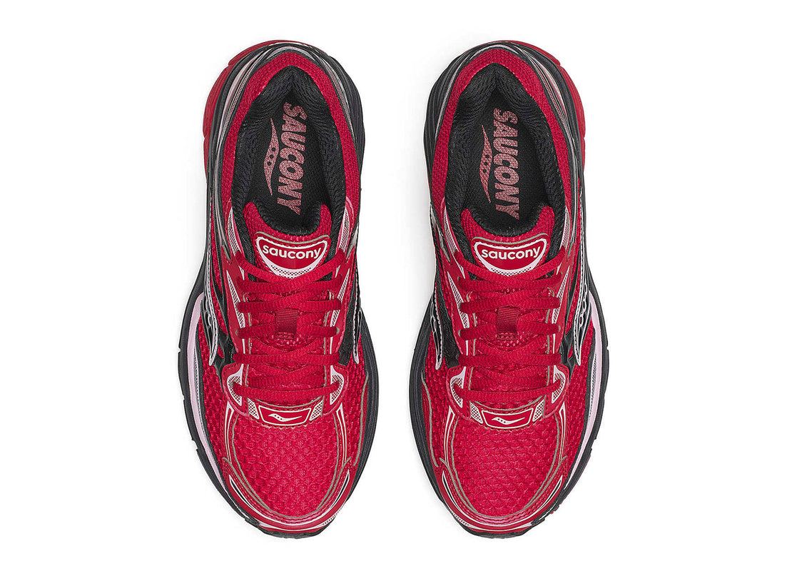 Sportieve Saucony ProGrid Omni 9 sneakers voor dames in rood en zwart, ontworpen door CAPE EXCLUSIVES.