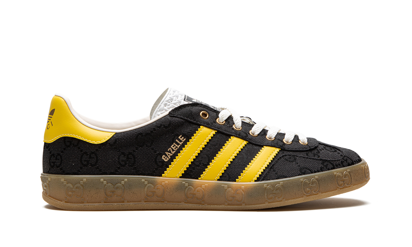 Zwarte Adidas Gucci Gazelle schoenen met GG Monogram patroon en witte zool, stijlvolle sneakers voor dames of heren