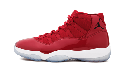 Elegante Air Jordan 11 Retro "Win Like 96" sportschoenen in zwart en wit met glanzende details en logo van Mijn winkel.