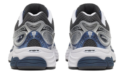 Zwarte Saucony ProGrid Omni 9 sneakers met navy details, CAPE EXCLUSIVES, zichtbaar van achteraan.