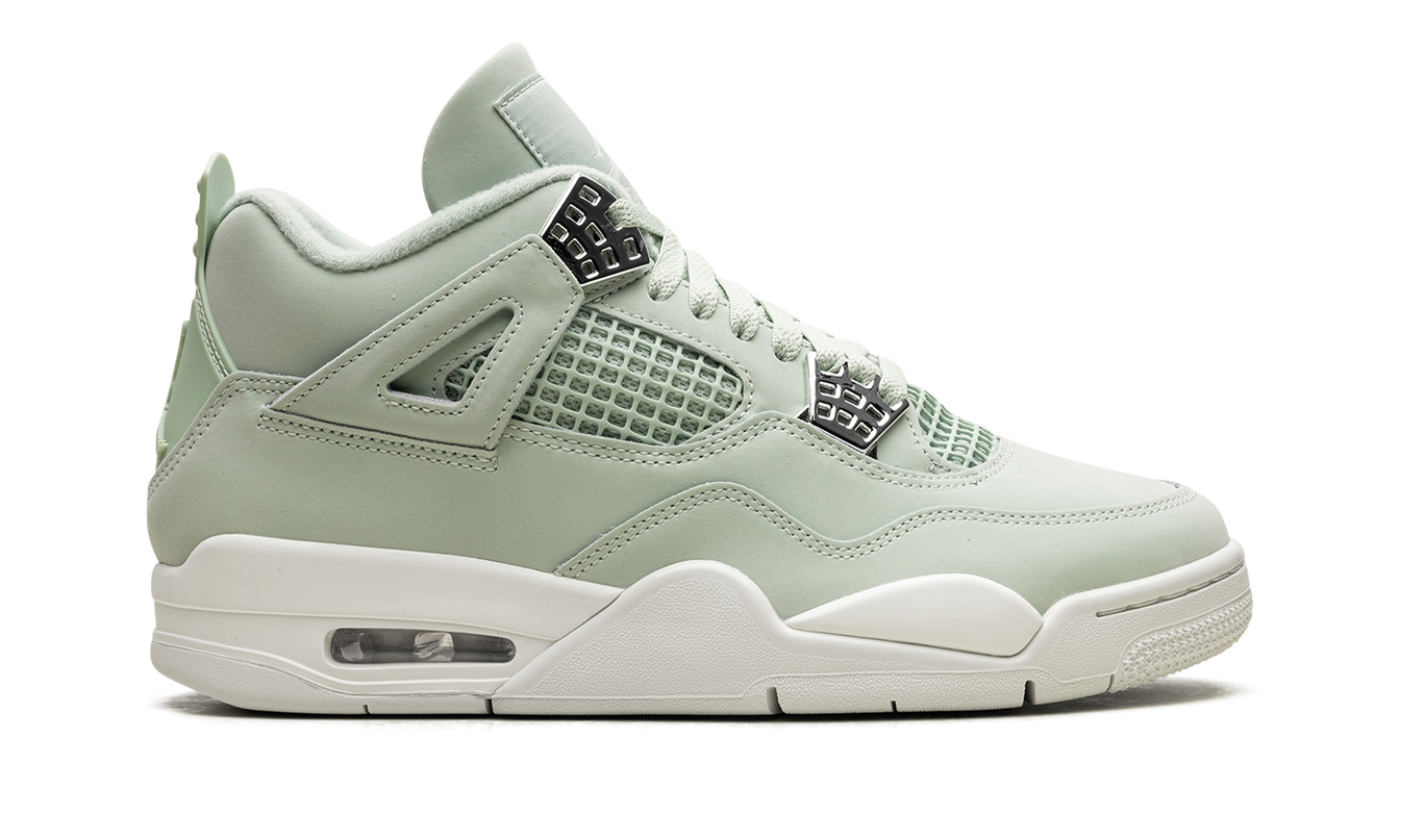 Witte Air Jordan 4 WMNS "Abundance" sneakers van Mijn winkel, close-up van de schoen met details en textuur.