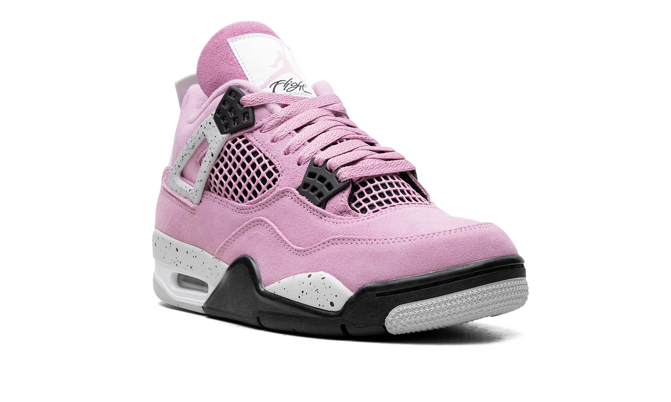 Zwarte Air Jordan 4 WMNS "Orchid" sneakers met paarse details en witte zolen, geschikt voor dames.